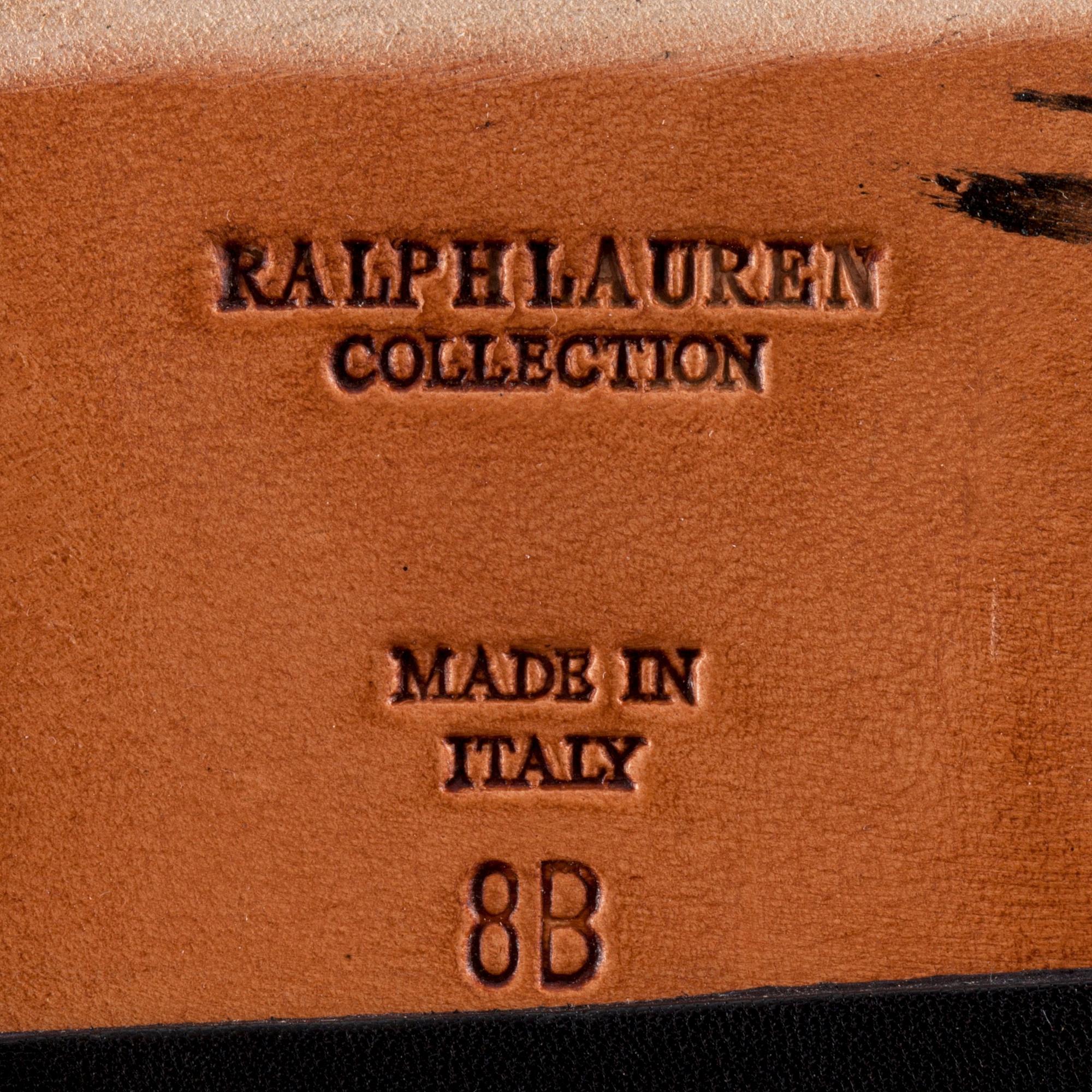 RALPH LAUREN, a pair of black canvas and leather boots. Size US 8.