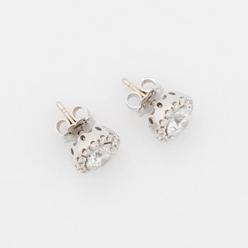 A pair of 18K white gold earrings.