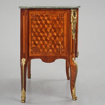 A Louis XVI rosewood and amaranth marquetry ormolu-mounted commode by Leonard Boudin (master in Paris 1761).