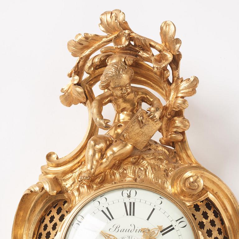 A French Louis XV ormolu cartel clock marked Baudin à Paris, mid 18th century.