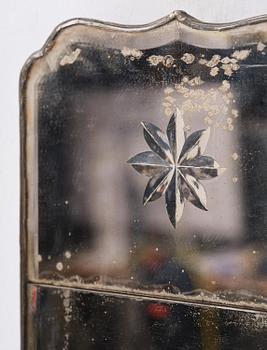 A pair of Gustavian engraved glass one-branch girandole mirrors by N. Meunier (master in Stockholm 1754-97).