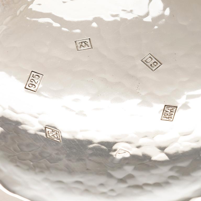 A set of three sterling silver and enamel bowls, maker's mark of A. Tillander, Turku 2005.