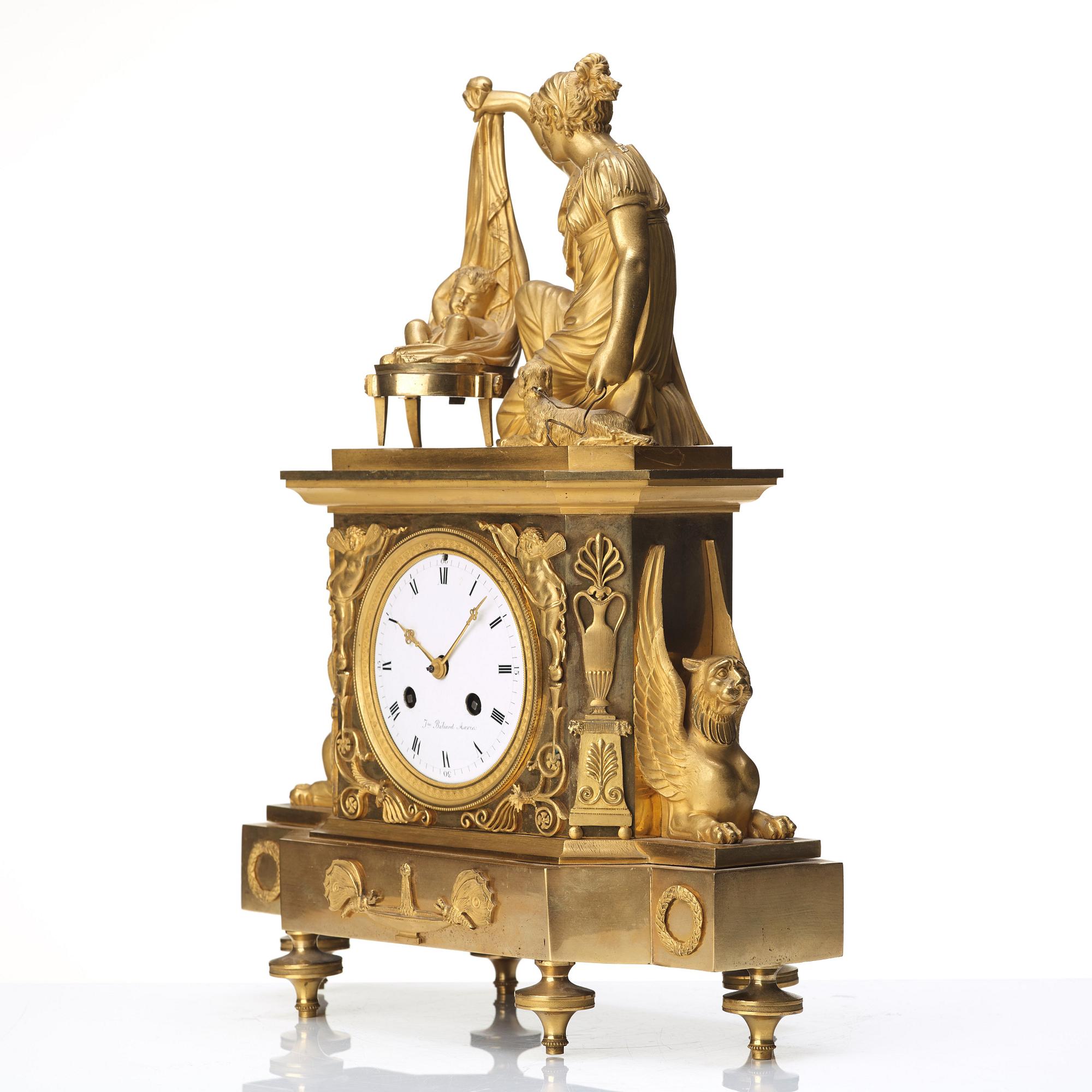 A Empire early 19th century gilt bronze mantel clock.