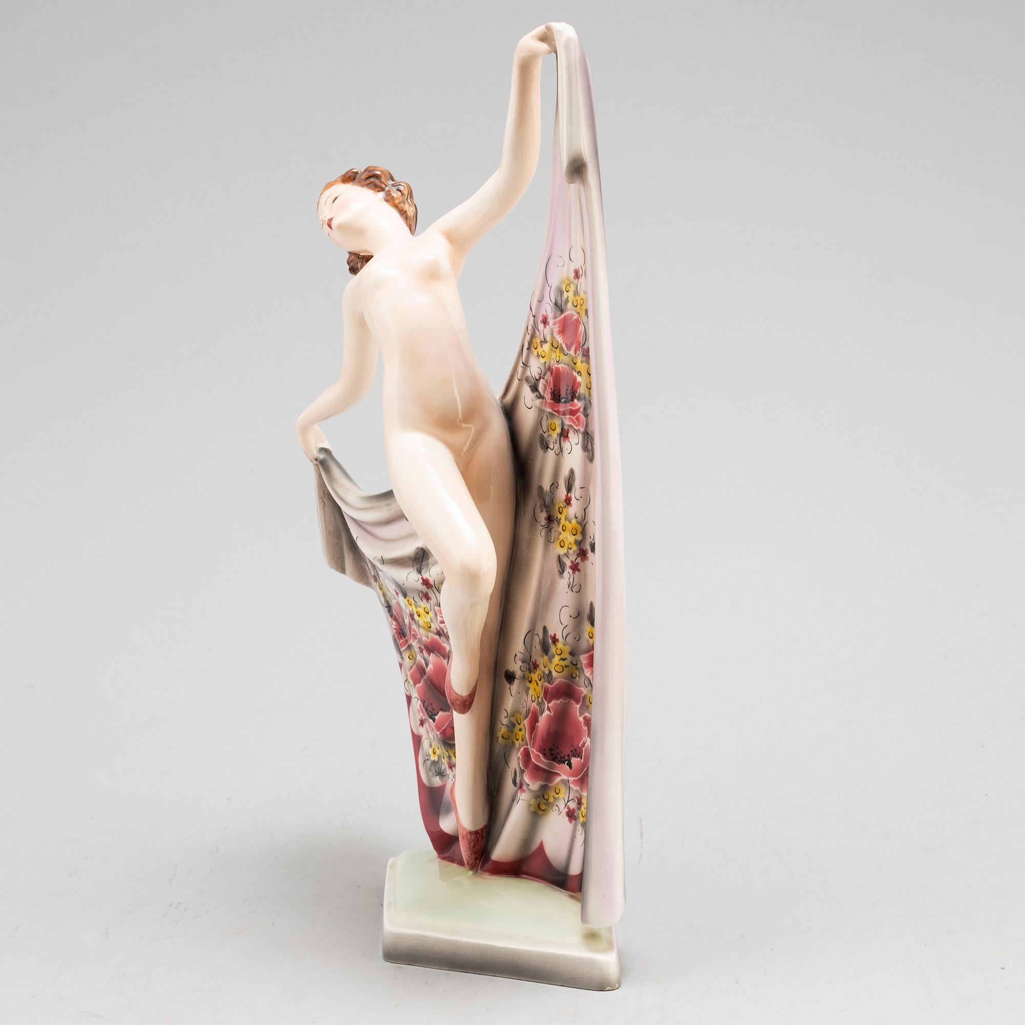 A porcelain figurine by Goldscheider, Vienna.