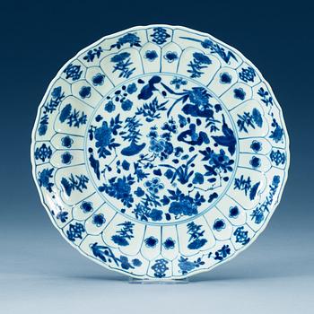 1806. A blue and white dish, Qing dynasty, with Kangxi six character mark and of the period (1662-1722).