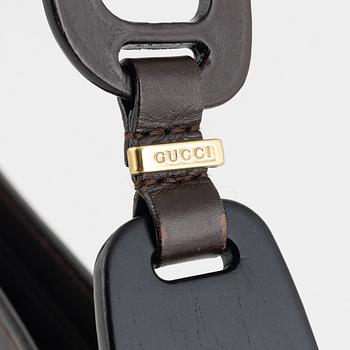 Gucci, a handbag.