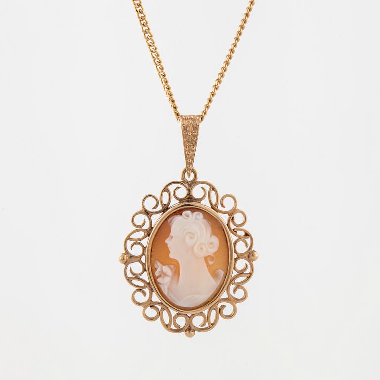 A cameo pendant.