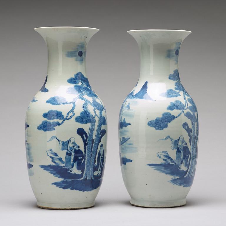 A large pair of blue and white vases, Qing dynasty, 19th Century.