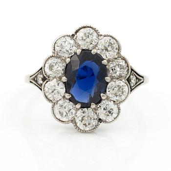 Carmose ring in platinum with sapphire and old-cut diamonds.