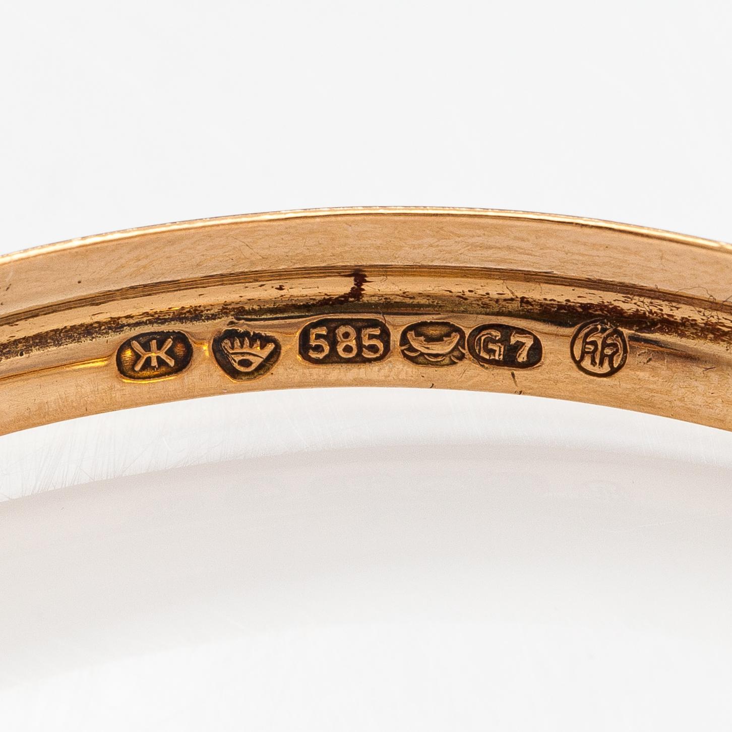 A 14K gold bracelet. Kalevala Koru, Helsinki 1960.