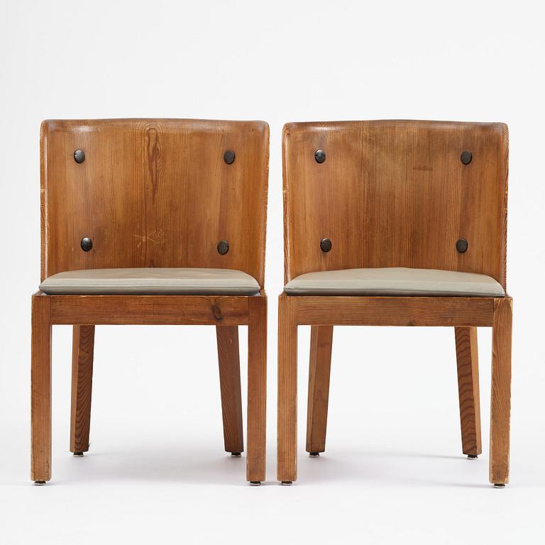 Axel Einar Hjorth, a pair of stained pine "Lovö" armchairs, Nordiska Kompaniet, Sweden, 1930s.