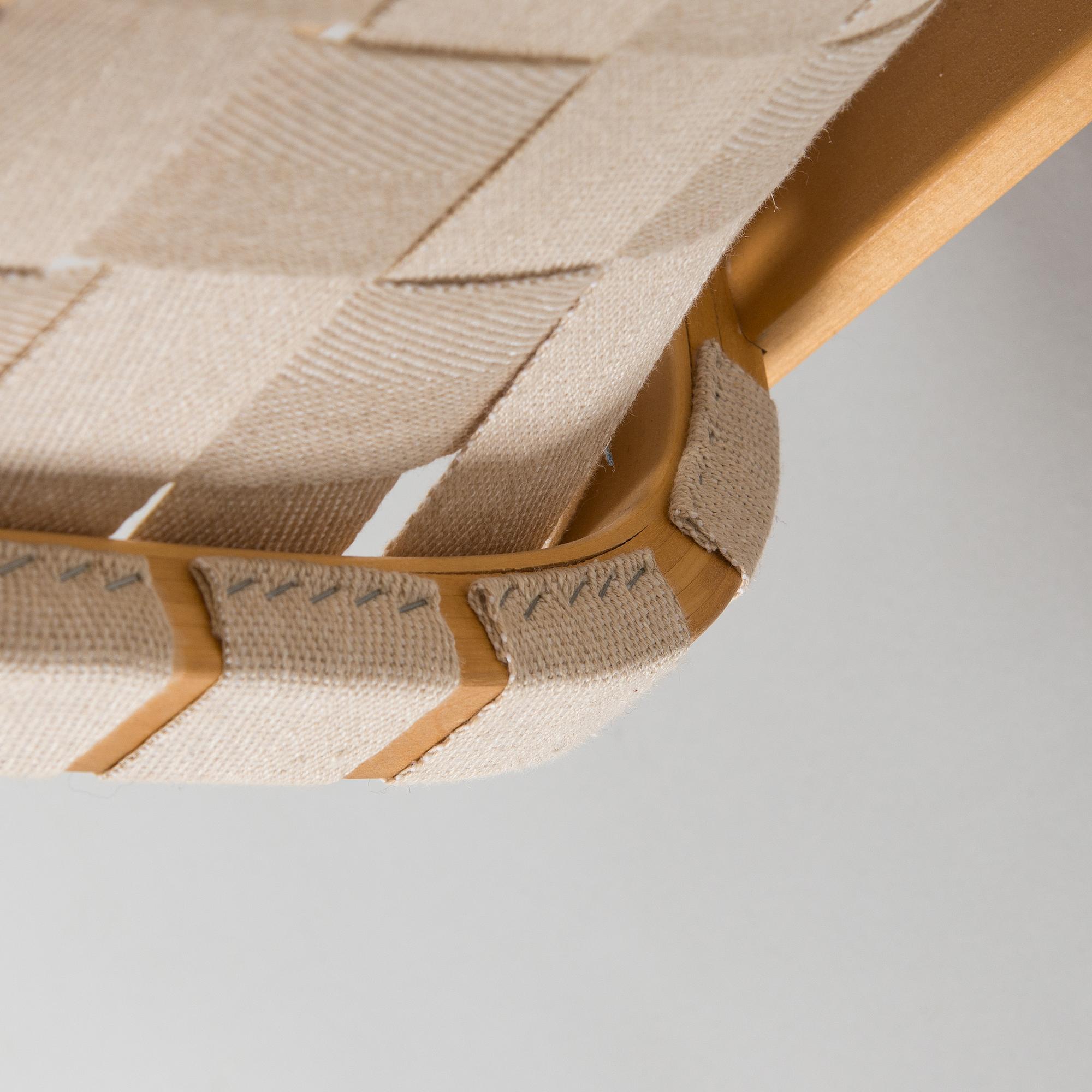 Alvar Aalto, a pair of late 20th century armchair model 406 Artek.