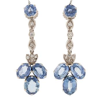 544. A pair of earrings with sapphires and diamonds, stamped Carlman.