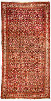 An antique Malayer carpet, Northwest Persia, ca. 410 x 207 cm.