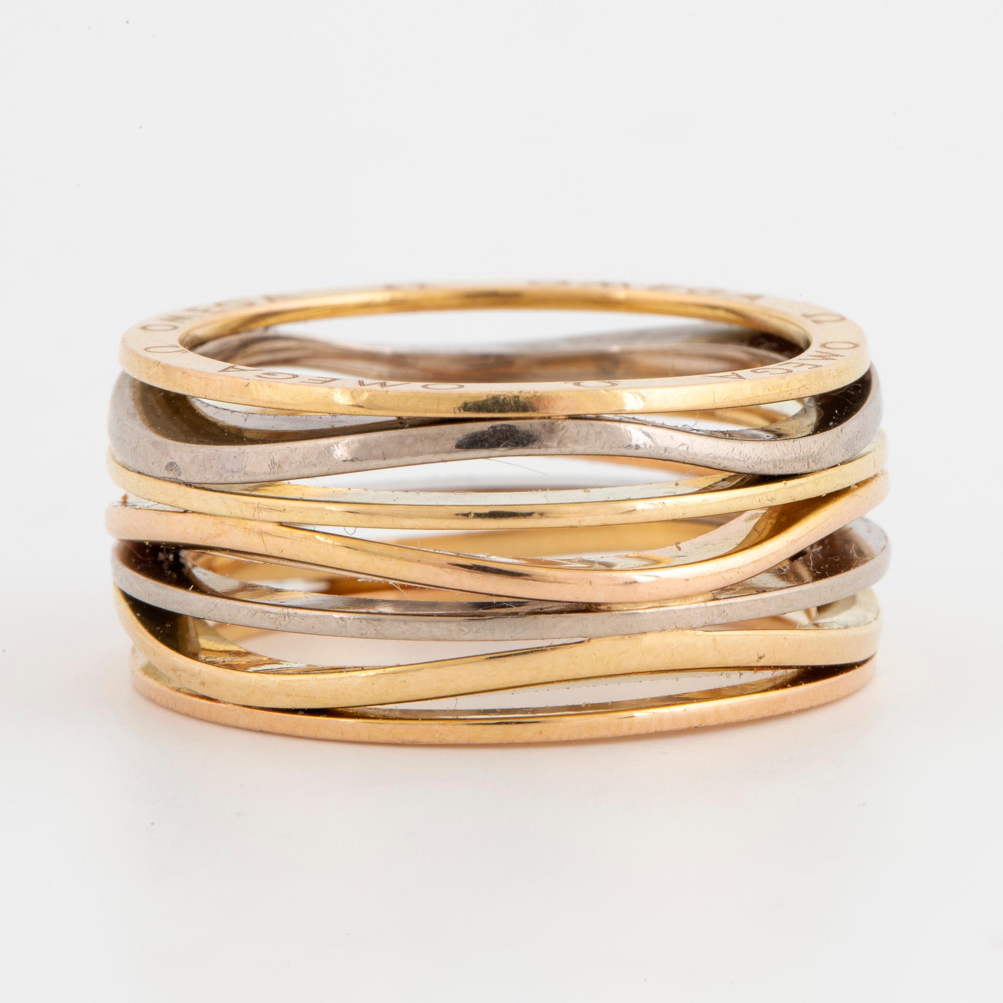 18K gold Omega ring.