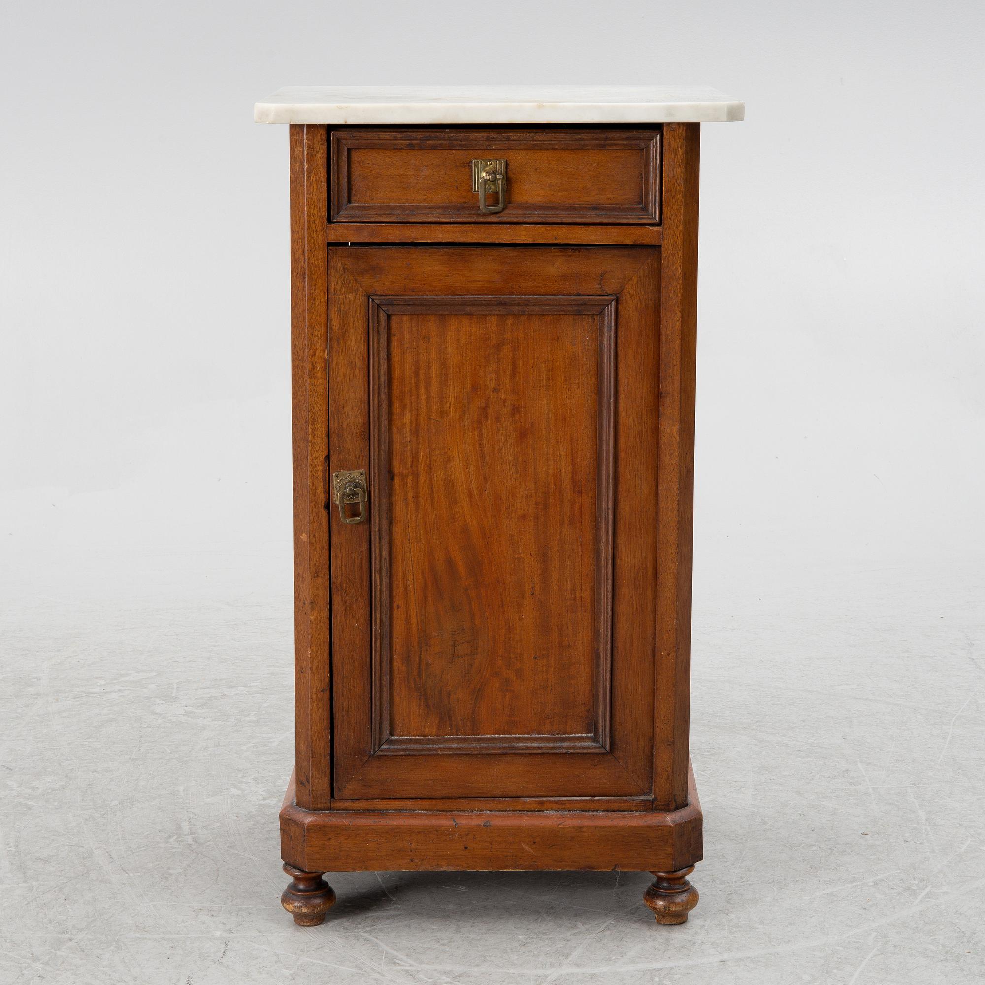A bedside table, circa 1900.