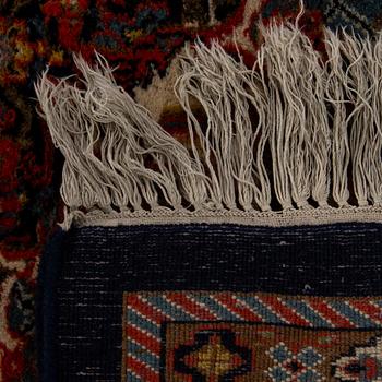 An old Malajir carpet ca 360 x 248 cm.
