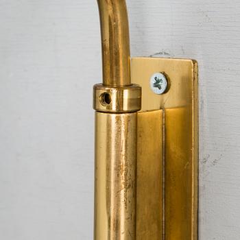 PAAVO TYNELL, a brass wall light, model 9459, for Oy Taito Ab.