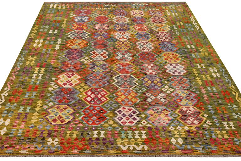 An Afghan Kilim carpet, c. 357 x 266 cm.