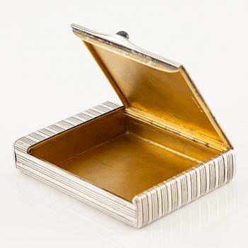 A Silver-gilt Fabergé Cigarette and Match Case, workmaster August Frederik Hollming, St. Petersburg 1908-1917.