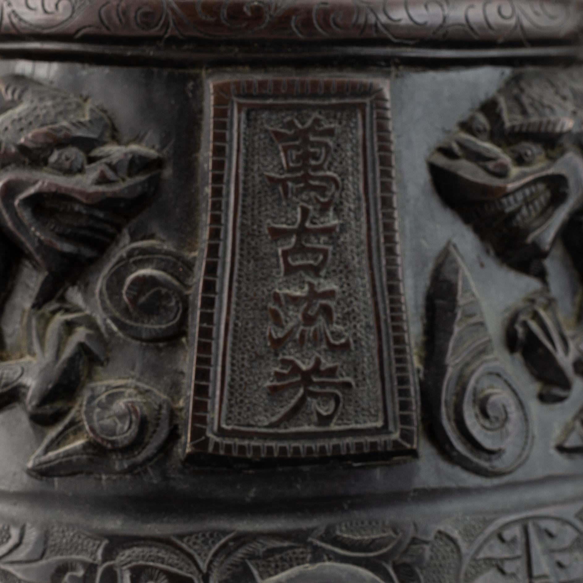 A Chinese bronze bell, early 20th Century.
