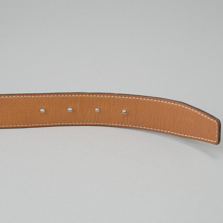 A belt by Hermès.