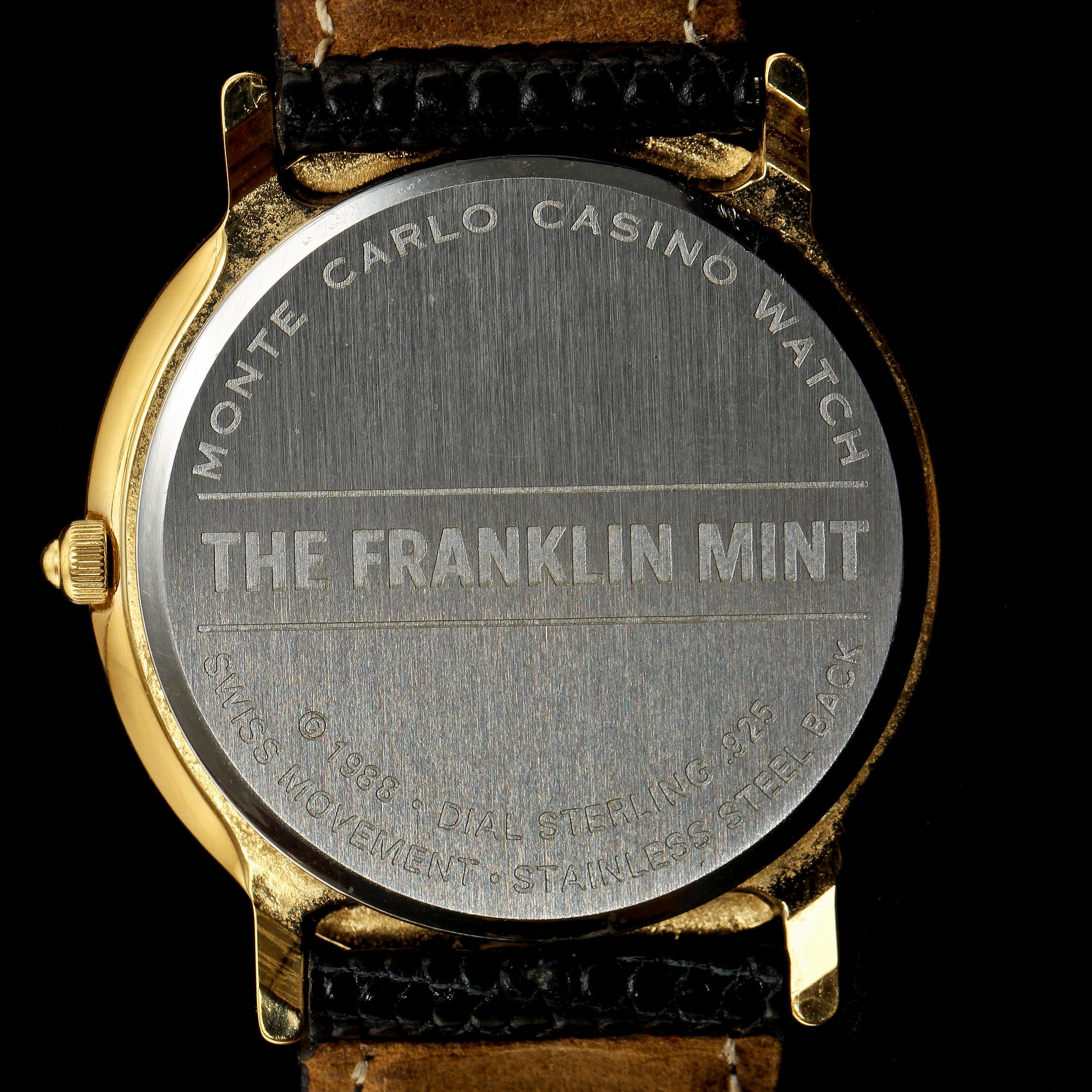 ARMBANDSUR samt RING, The Franklin Mint, sterlingsilver, onyx samt en fasettslipad liten diamant, 1900-tal. Vikt 45 g.