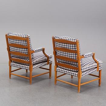 An end of the 20th Century pair of Gustavian style oak armchairs.
