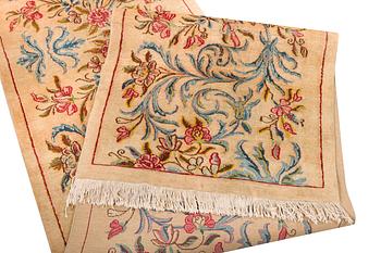 A semi-antique Keshan runner, c. 523 x 82 cm.
