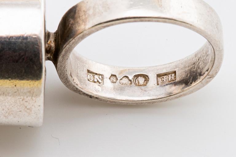 2 RINGS, 18K gold w smoky quartz approx 14 mm, silver and gold w rock crystal approx 16 mm, Stockholm 1963.