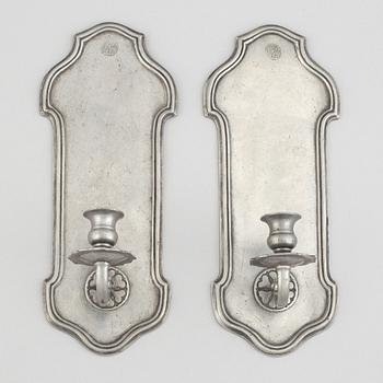A pair of pewter wall sconces, 1920's/30's.