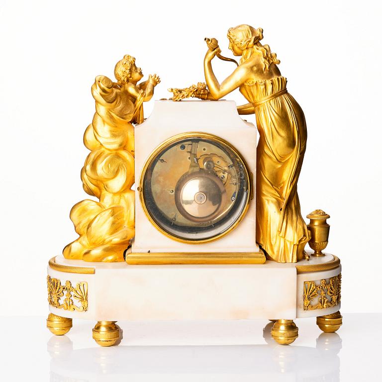 A Louis XVI marble and ormolu mantel clock, late 18th century.