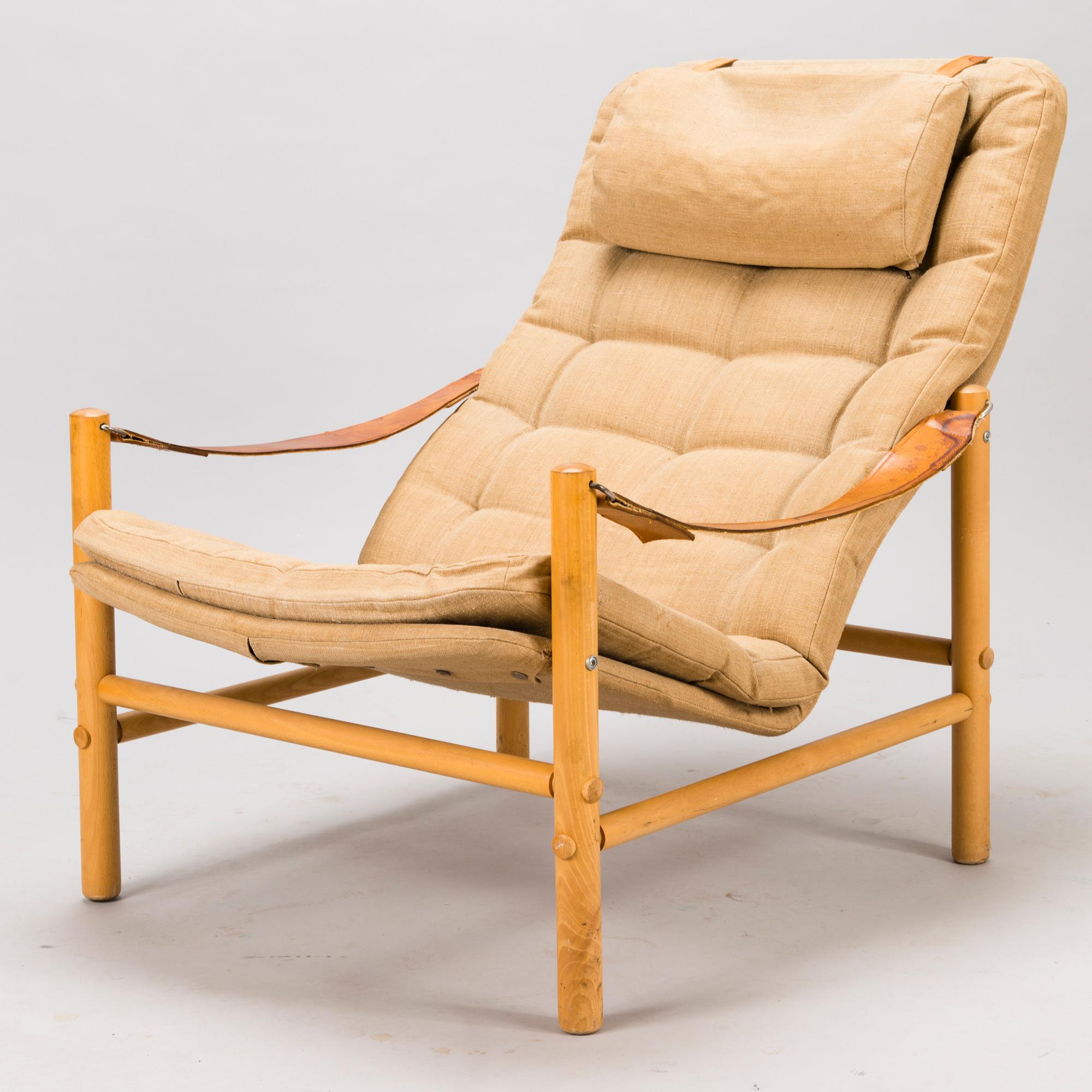 BROR BOIJE, A pair of 'Junker' easy chairs and an ottoman for Dux, Sweden, latter half of the 20th Century.