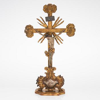A 19th century gilded and painted wood crucifix.