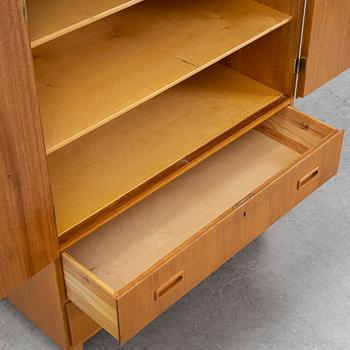 A 1950's/60's teak cabinet.