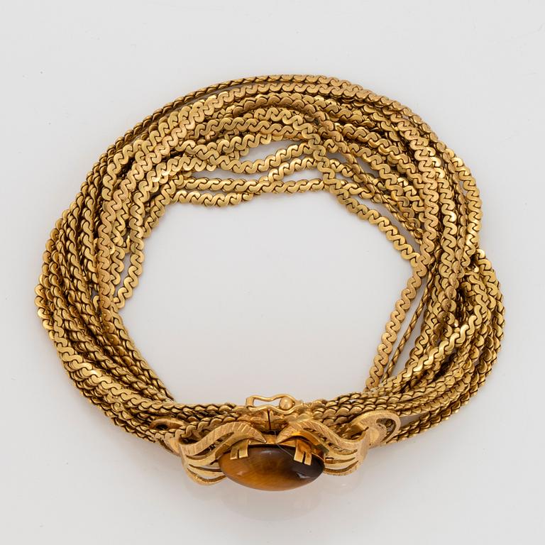 Armband 18K guld med kvarts-kattöga.