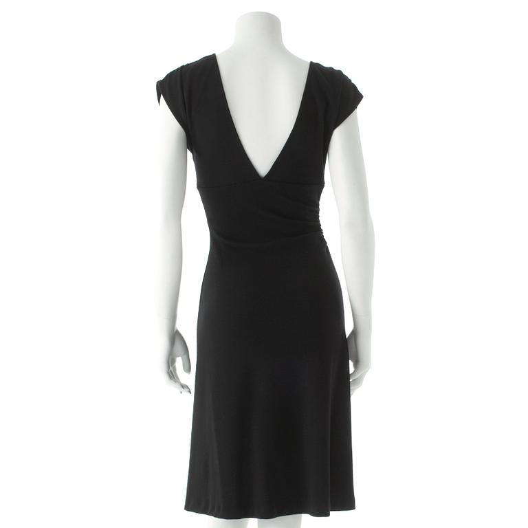 DIANE VON FURSTENBERG, a black wool dress.