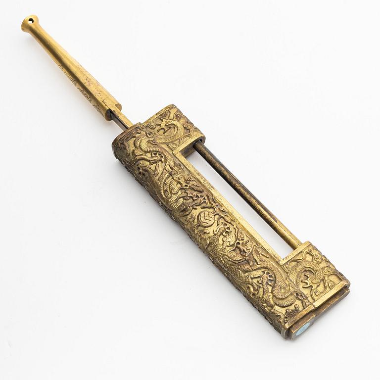 A Chinese gilt five-clawed 'dragon' lock, Qing dynasty, Qianlong (1736-95).