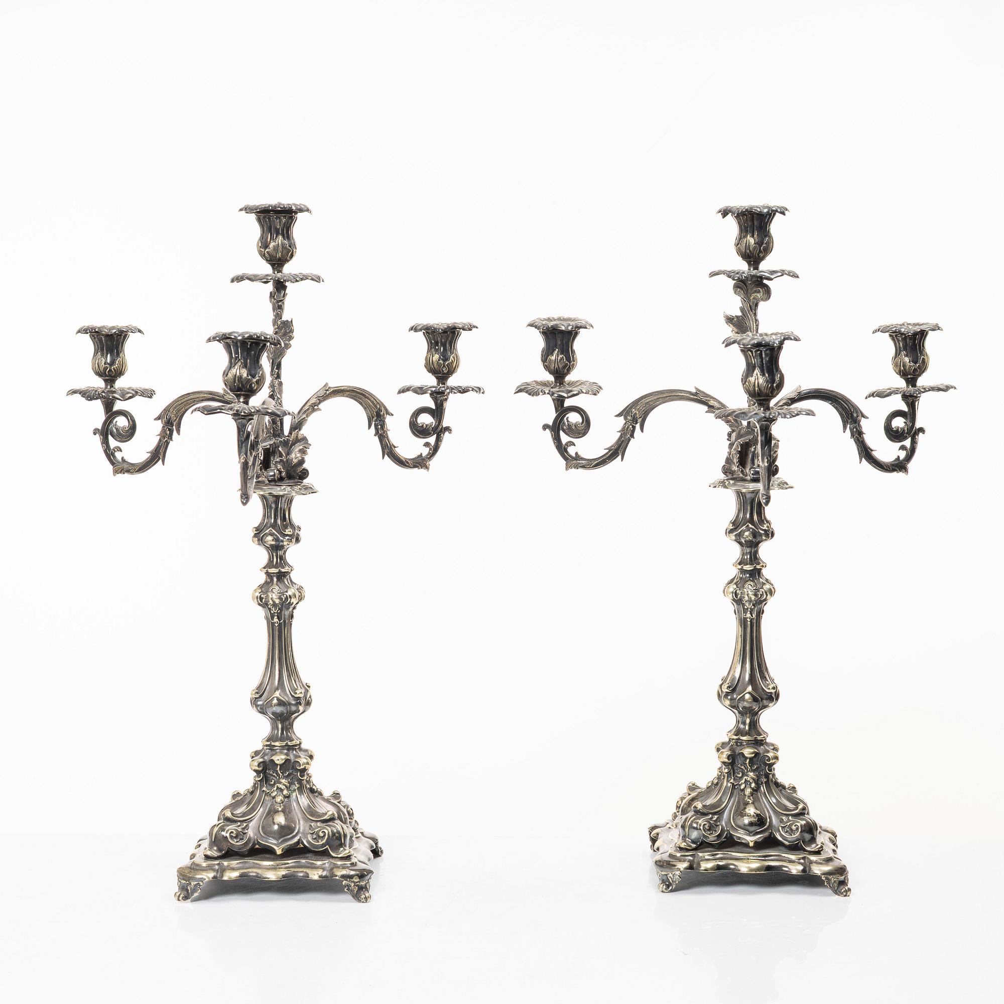 A pair of silver plated Rococo style candelabra, 20th century.