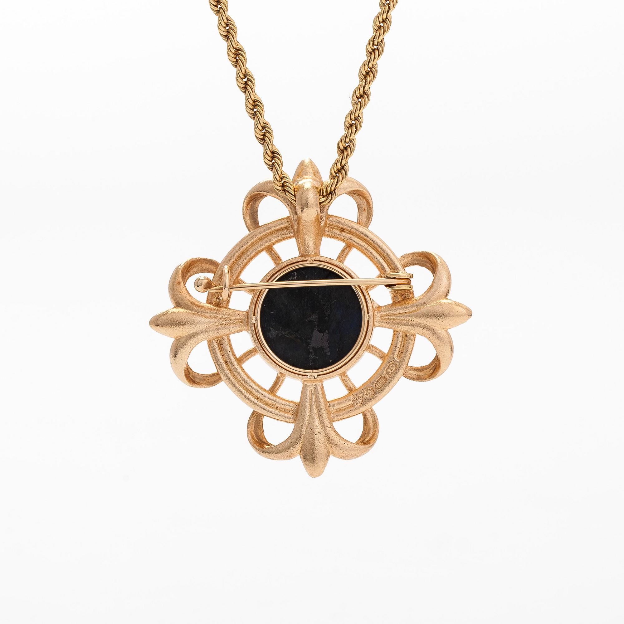 Kalevala Koru, a pendant/brooch with chain, "Lily", 14K gold and spectrolite. Helsinki 2002.