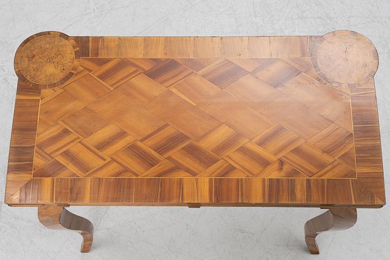 A Rococo table, 18th century.