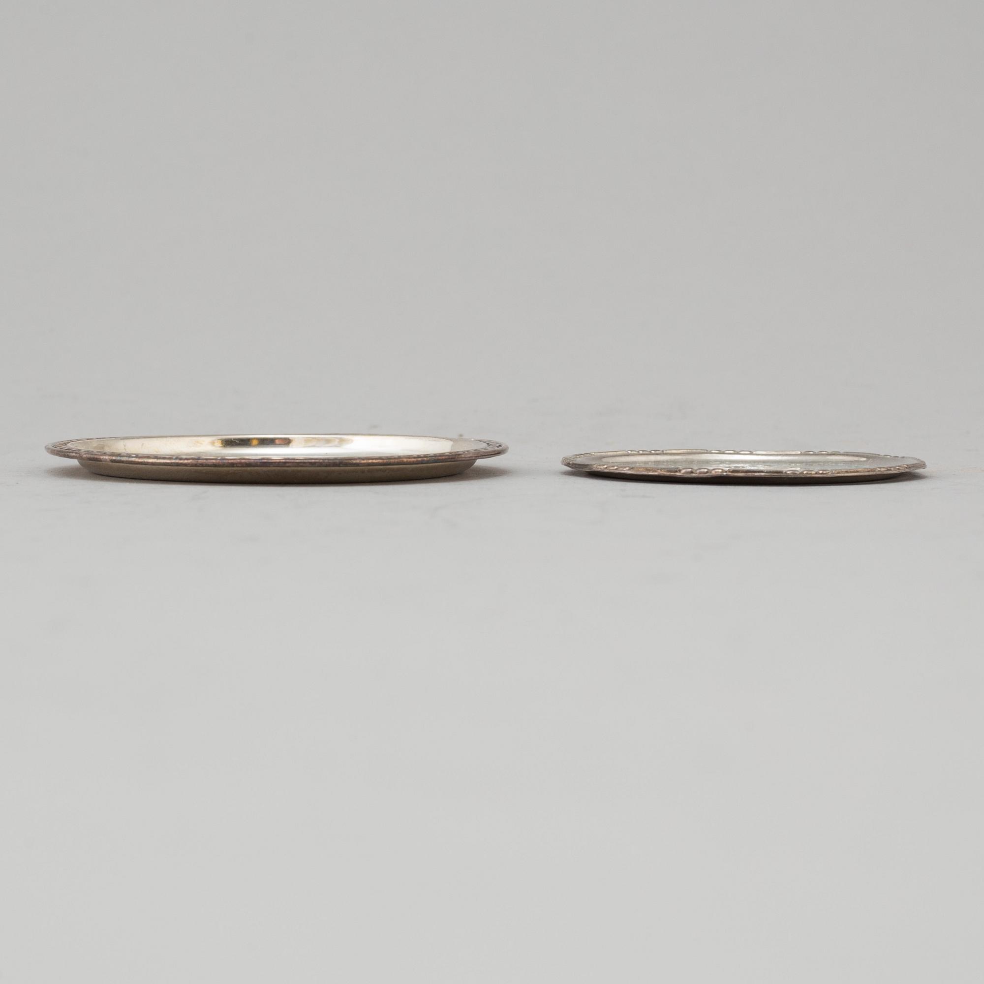 GLASUNDERLÄGG/COASTERS, 11 st, silver. Georg Jensen, sterling, Danmark respektive GAB, Stockholm, 1963-5.