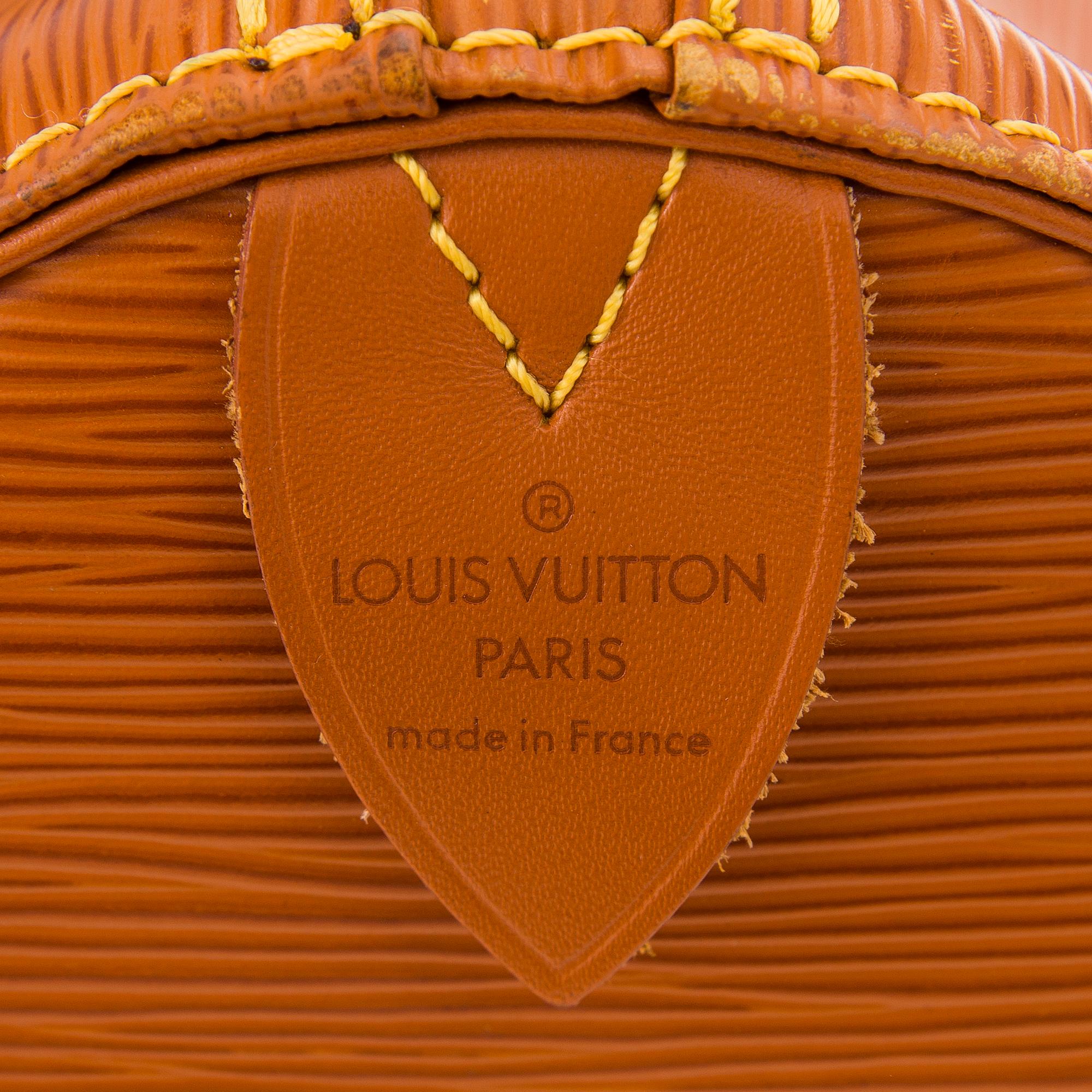 A LOUIS VUITTON CIPANGO GOLD KEEPALL 50 EPI TRAVEL BAG.