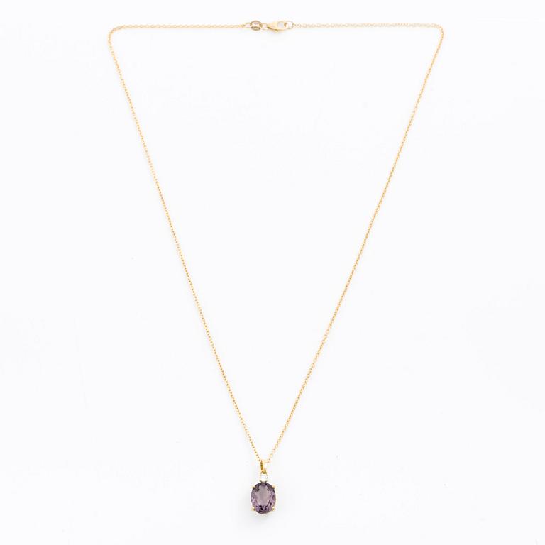 Necklace 18K gold with purple tourmaline and brilliant-cut diamond.
