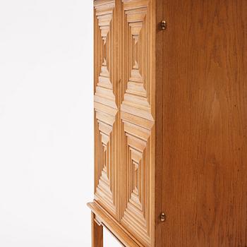 Oscar Nilsson, attributed to, a Swedish Modern oak cabinet, 1940s.