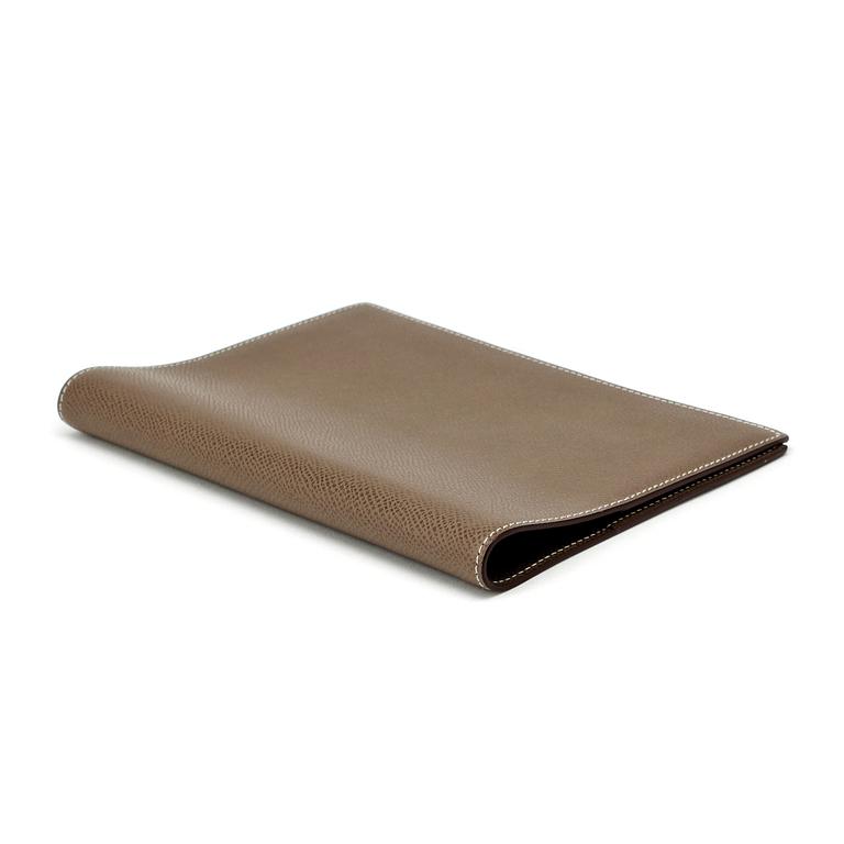 HERMÈS, a grey leather agenda cover, "Globe Trotter".