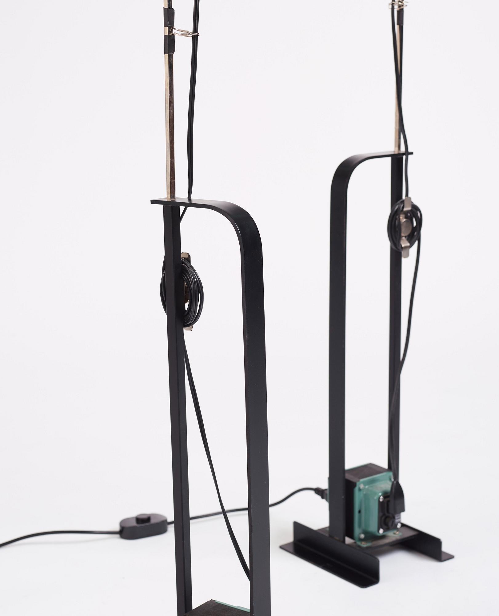 Achille Castiglioni, & Pier Castiglioni, a pair of "Toio" floor lamps, Flos, Italy, post 1963.