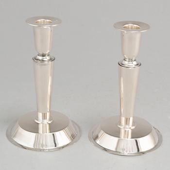 ERIC RÅSTRÖM, a pair of silver candlesticks, Stockholm 1954.