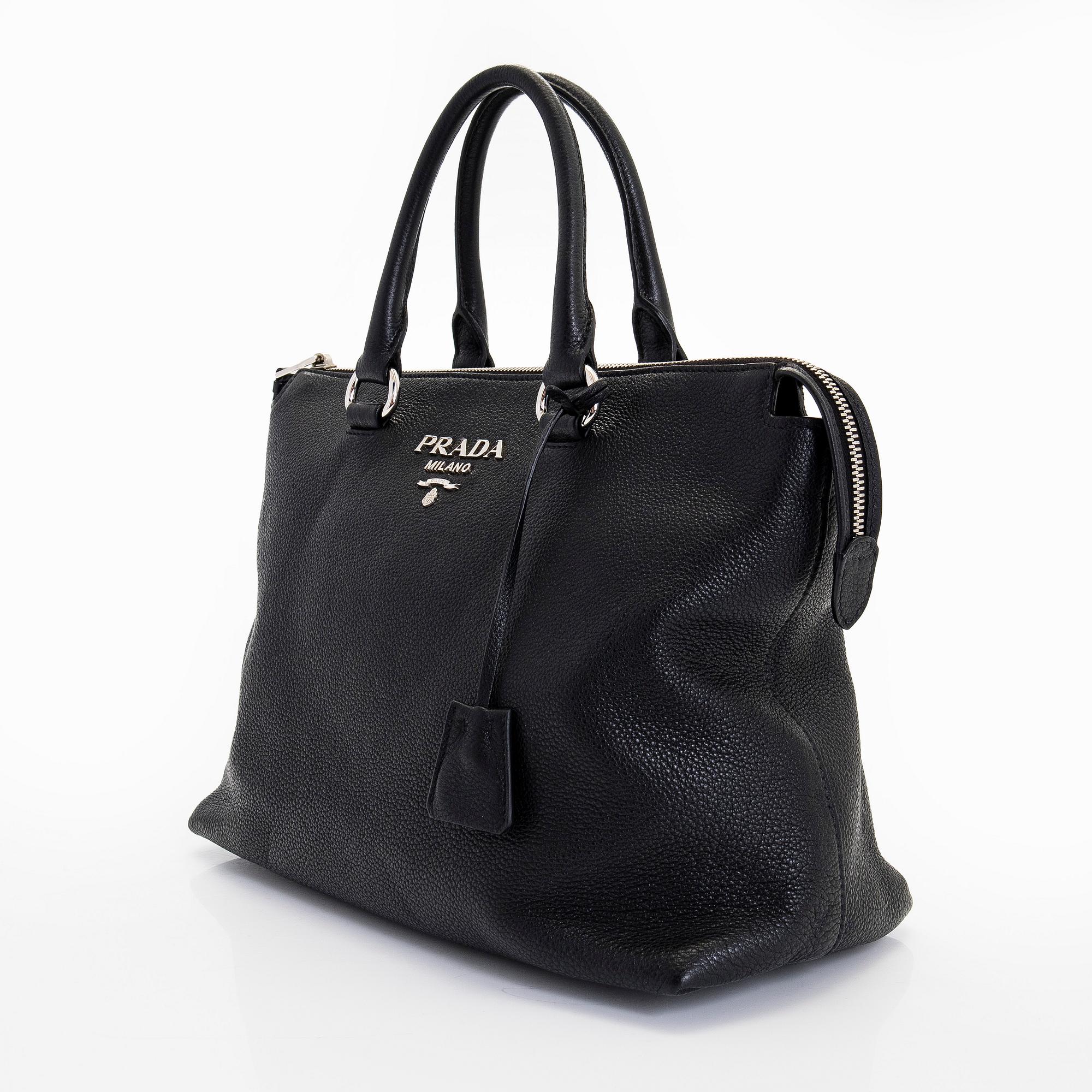 Prada, a leather bag.