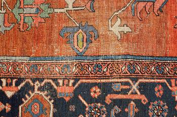 A carpet, an antique Heriz, ca 469,5-471 x 300-309,5 cm.